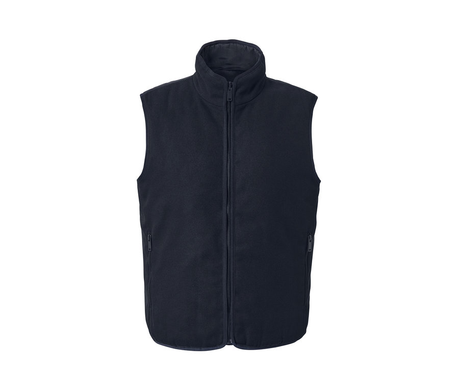 Tmavě modrá oboustranná vesta se zipem uprostřed.