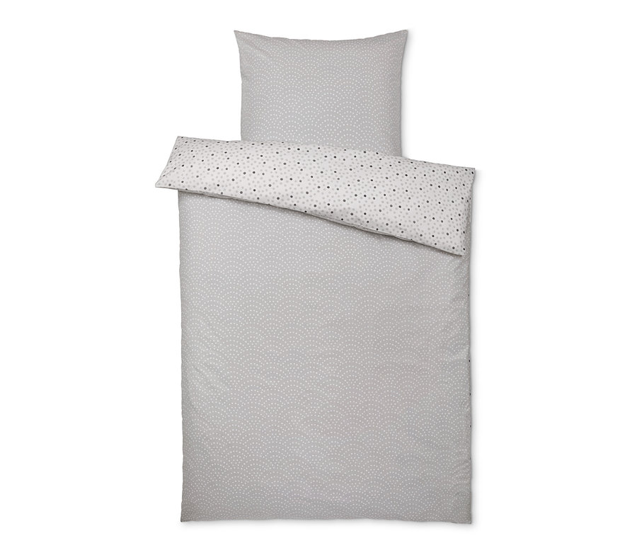 Sada povlečení renforcé standardní velikosti s bílým a šedým puntíkovaným vzorem.