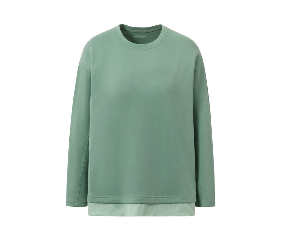 Zelené fitness tričko s dlouhým rukávem Oversized na bílém pozadí.