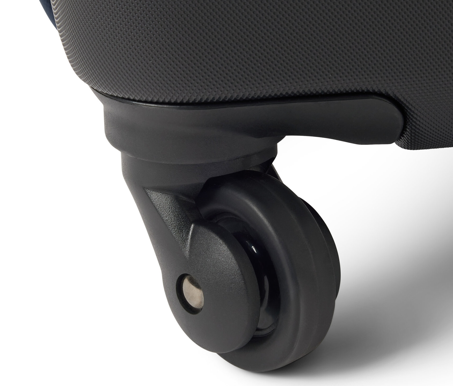 Detailní záběr na černé náhradní kolečko pro hybridní kufr.