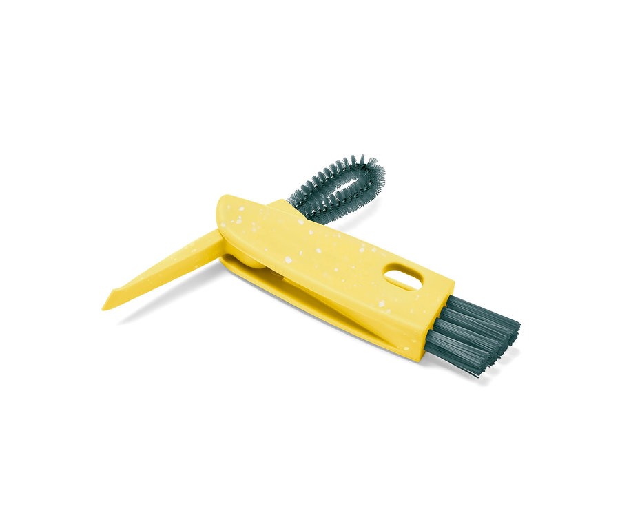 Žlutý multifunkční kartáč 3 v 1 s bílými skvrnami a třemi různými kartáčovými hlavami.