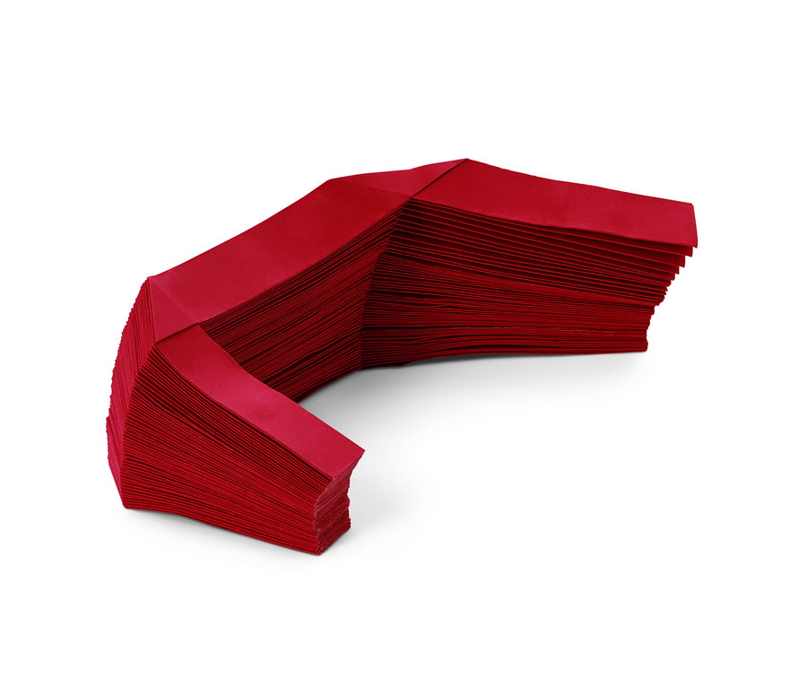 Červený papírový kryt na stojan vánočního stromku.