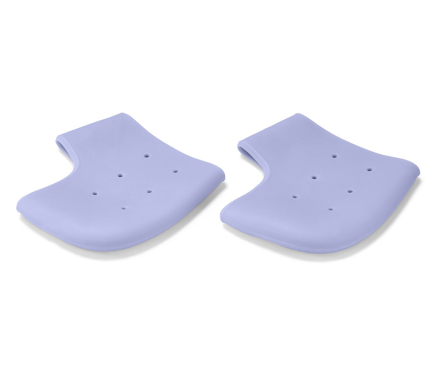 Dvě fialové silikonové patní chrániče s otvory na bílém pozadí.