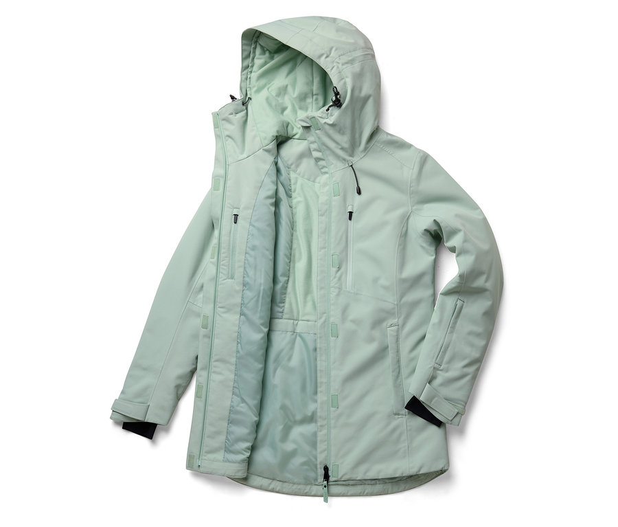 Otevřená bunda světle zelené barvy s kapucí. Bunda má zip a několik kapes.