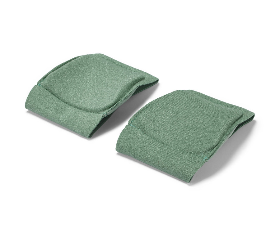 Dva zelené návleky na masáž fascií.