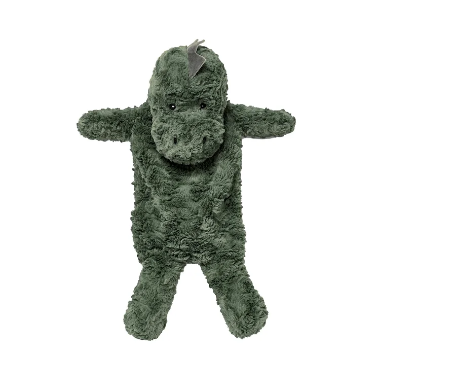 Zelený termofor ve tvaru dinosaura.