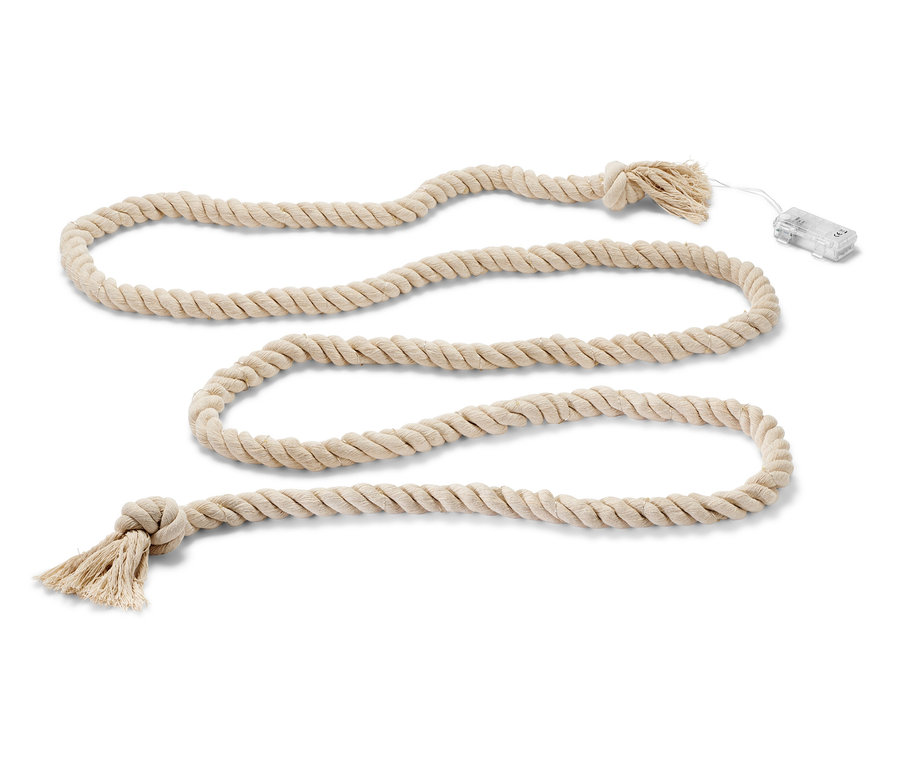 Světelný řetěz s LED »Lano« stočený do smyček na bílém pozadí.