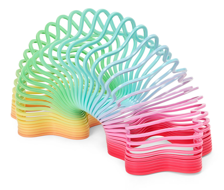 Spirálovitá hračka přecházející ze žluté přes zelenou a modrou do růžové a červené.