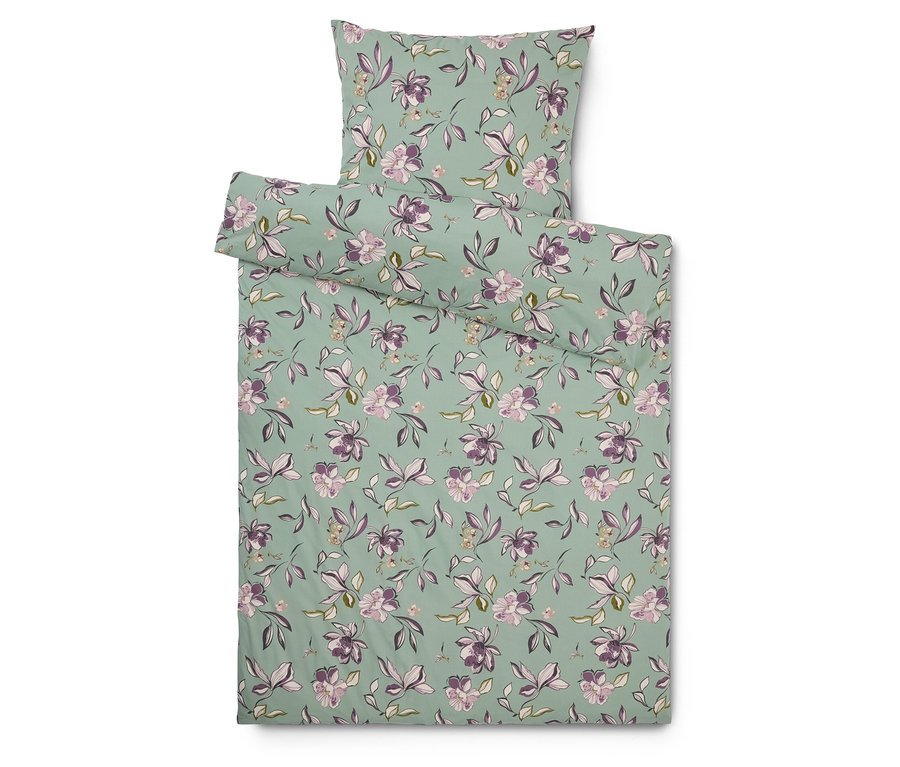 Ložní souprava s květinovým vzorem na mátovém pozadí, včetně povlaku na polštář.