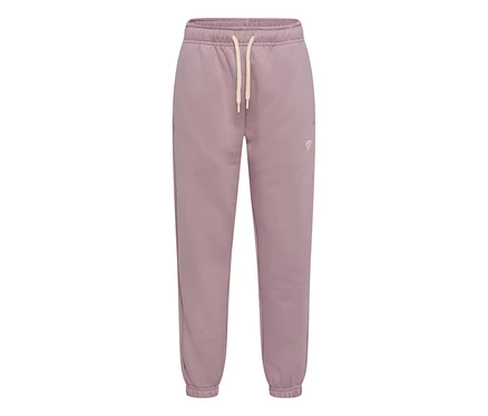 Tepláky hummel® »HMLJR Loose Sweatpants Bee« v matné fialové barvě s elastickým pasem, světle béžovou stahovací šňůrkou a manžetami u kotníků. Malé logo na pravém stehně.
