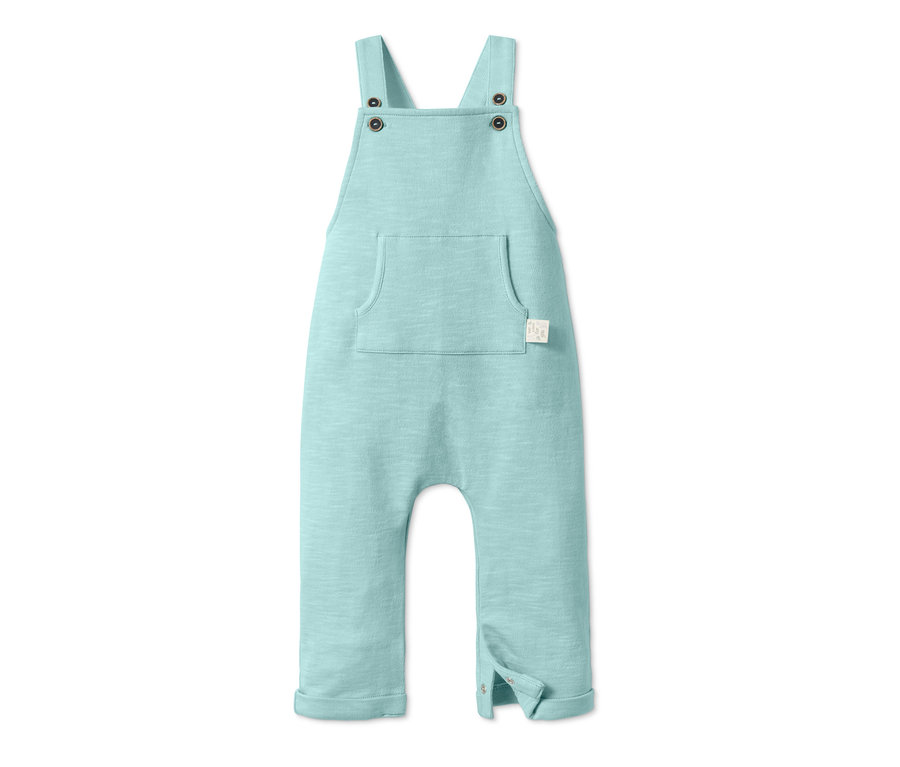 Světle zelené bavlněné kalhoty s laclem.