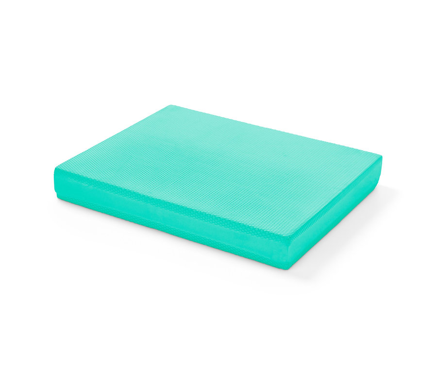 Balanční podložka na bílém pozadí.