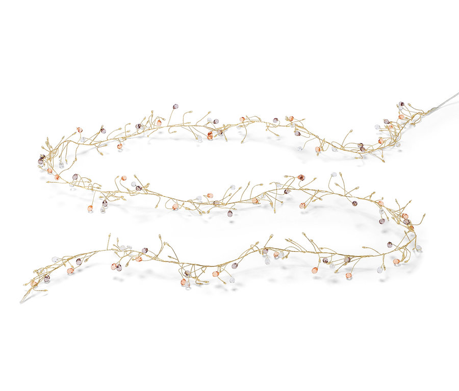 Girlanda s LED světly na bílém pozadí.