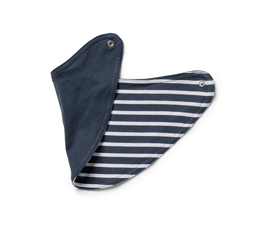 Náprsenka ze soupravy pro miminka, 3dílná, s jednou stranou tmavě modrou a druhou pruhovanou.