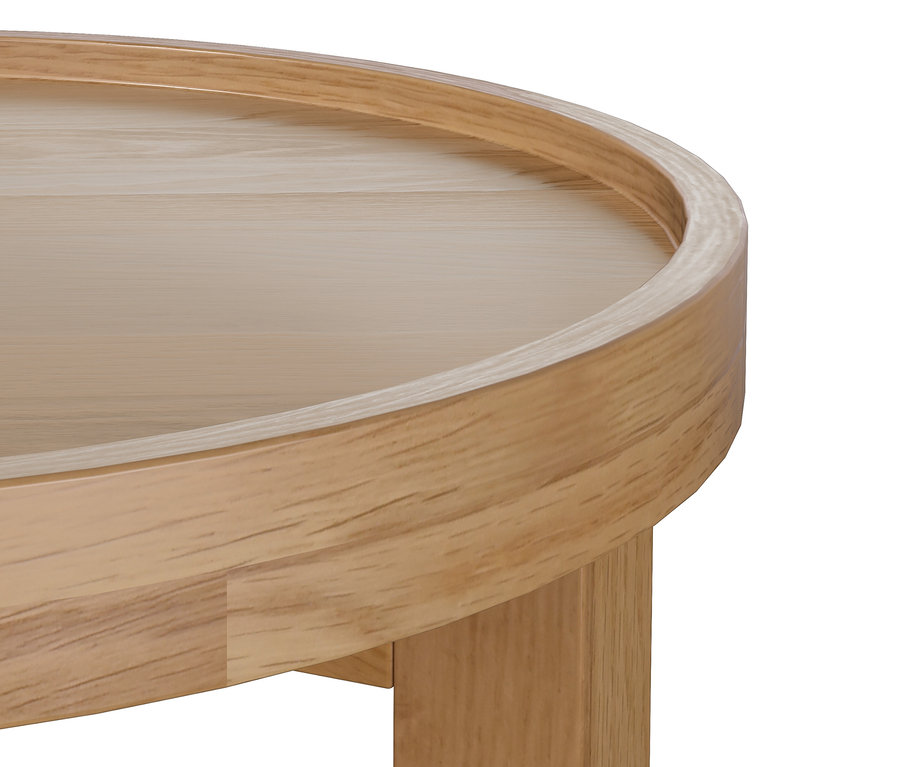 Detail kulatého stolku ze světlého dřeva.