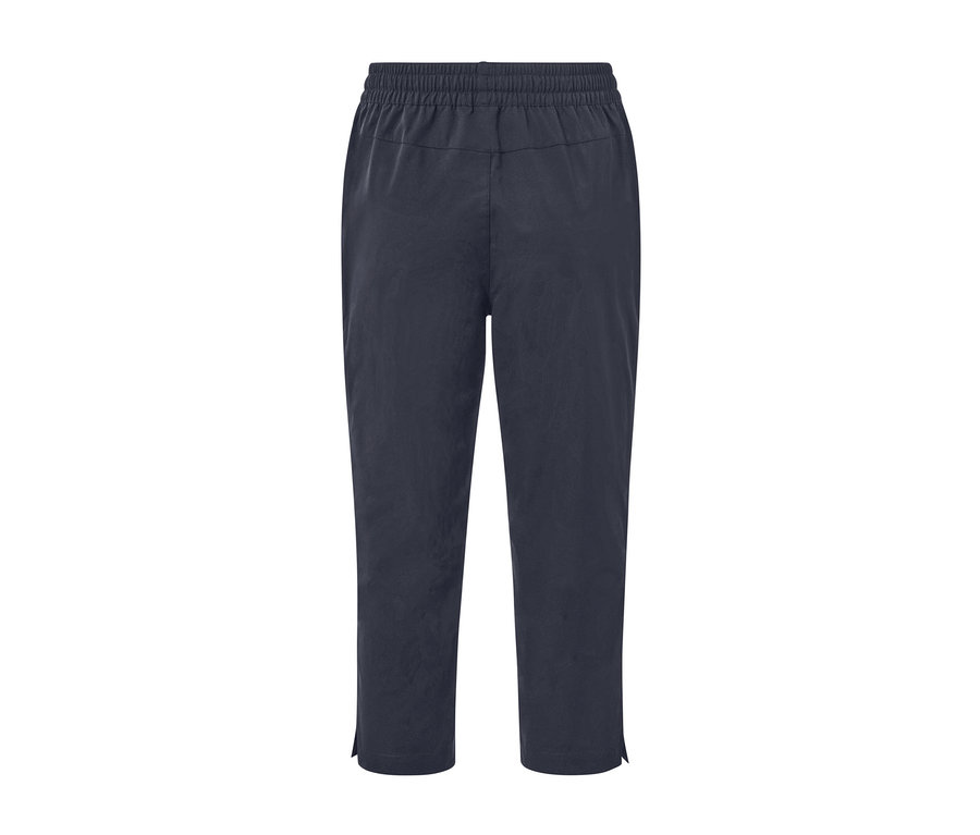 Tmavě modré funkční softshellové capri kalhoty s elastickým pasem.