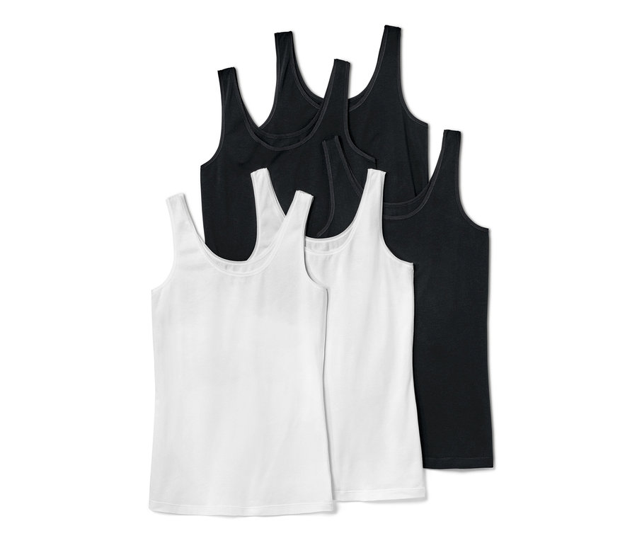 Pět halenek: dvě bílé a tři černé.