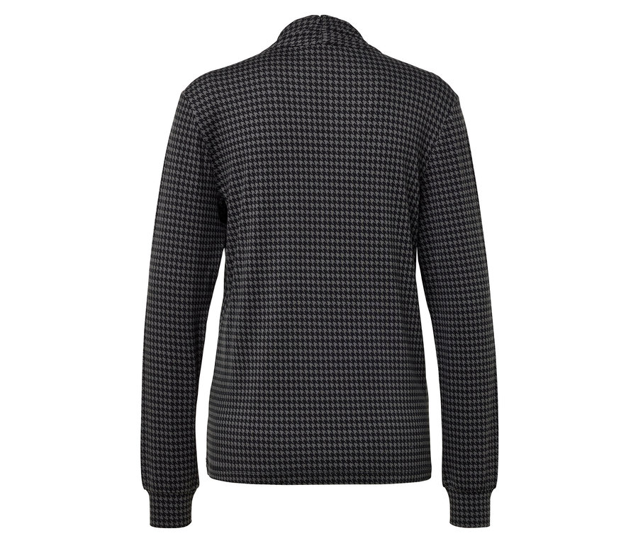 Detail zadní strany svetru s kohoutí stopou v černé a šedé barvě.