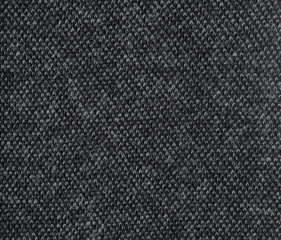 Detailní záběr na texturu strukturovaných punčochových kalhot.