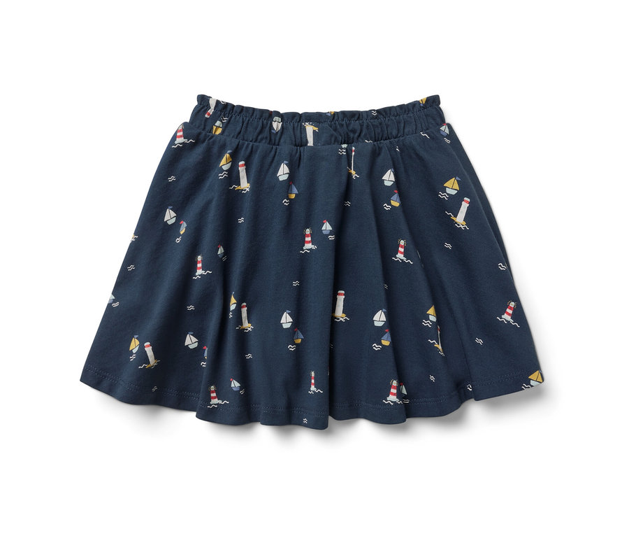Tmavě modrá dívčí žerzejová sukně s námořnickým vzorem majáků a lodí.