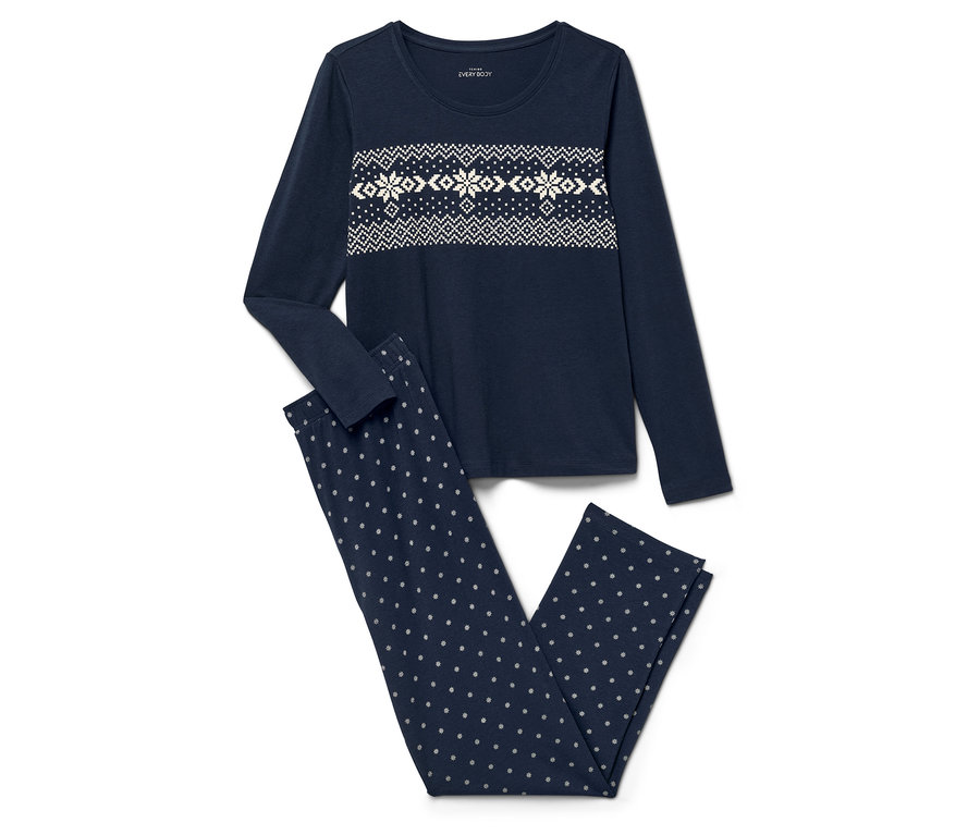 Tmavě modré pyžamo s dlouhým rukávem a vzorem sněhových vloček a kalhotami s puntíky.