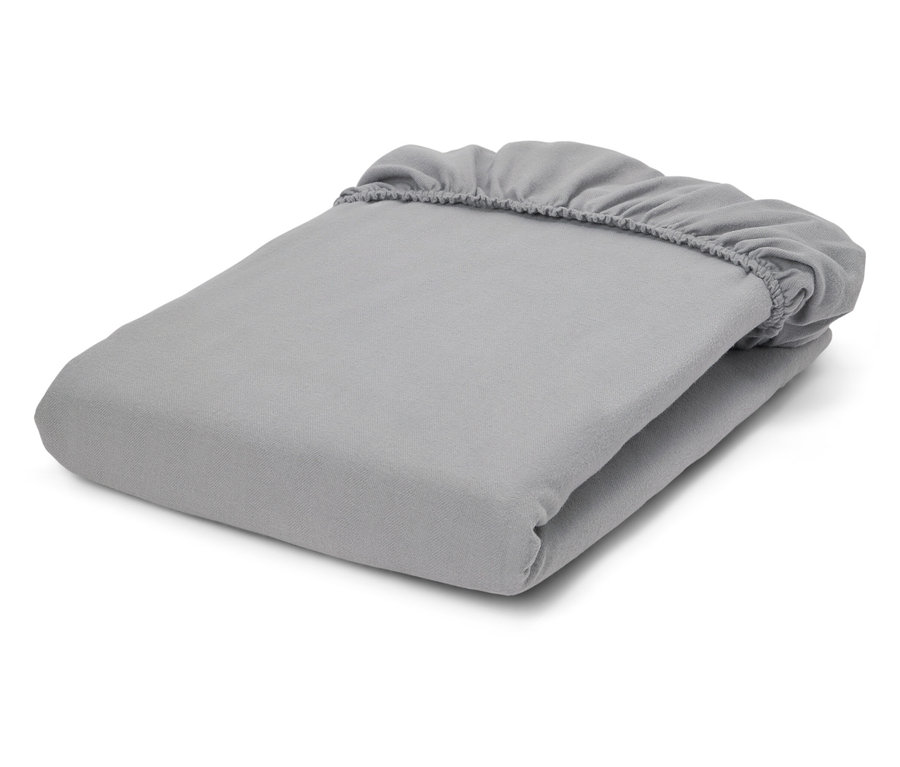 Složený šedý napínací prostěradlo s elastickými rohy.