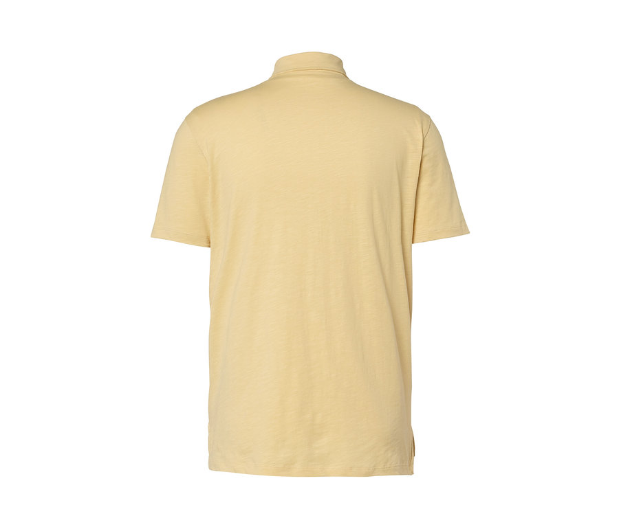 Žlutá žerzejová polokošile s melírem.