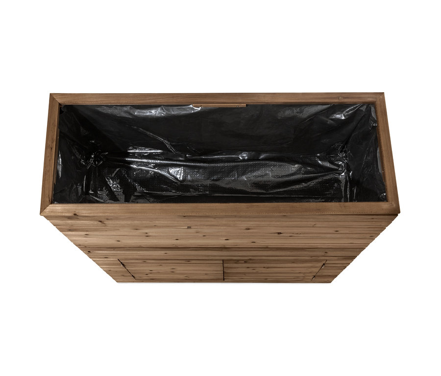 Pohled shora na prvek pro rozdělení prostoru s truhlíkem »Tinus« a úložnou skříňkou s černou vložkou.