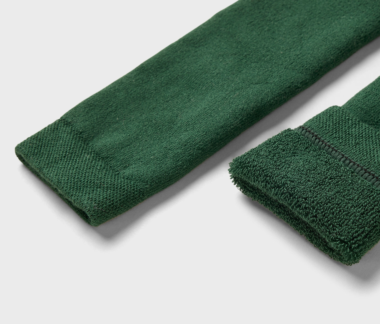 Detail zelené ponožky.