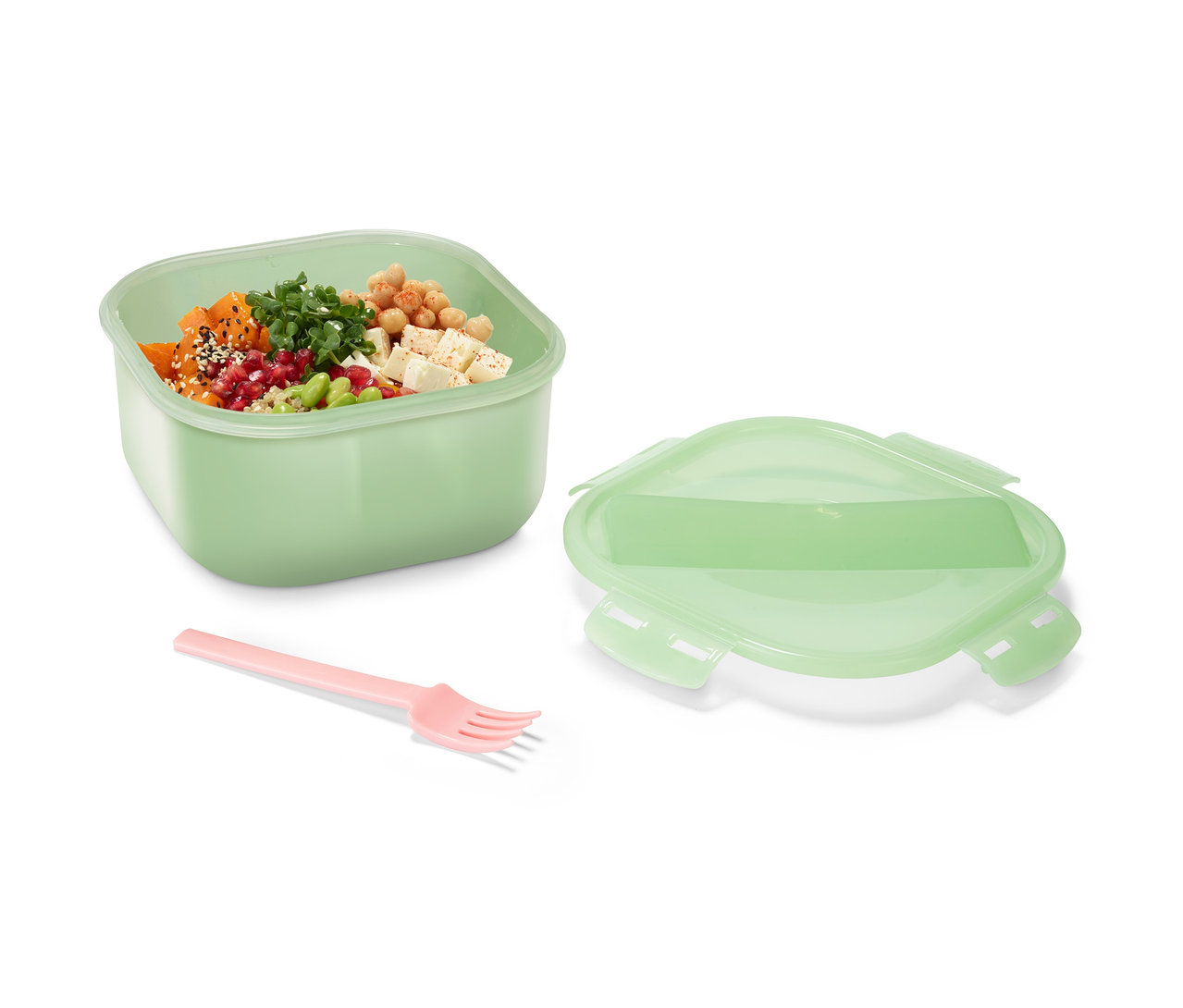 Zelený cestovní box na svačinu s obsahem a růžovou vidličkou.