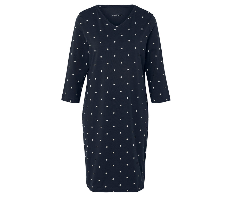 Modré šaty s bílými puntíky a 3/4 rukávy.