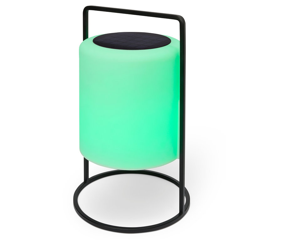 Zelená lampa s černým reproduktorem nahoře a černým kovovým rámem.