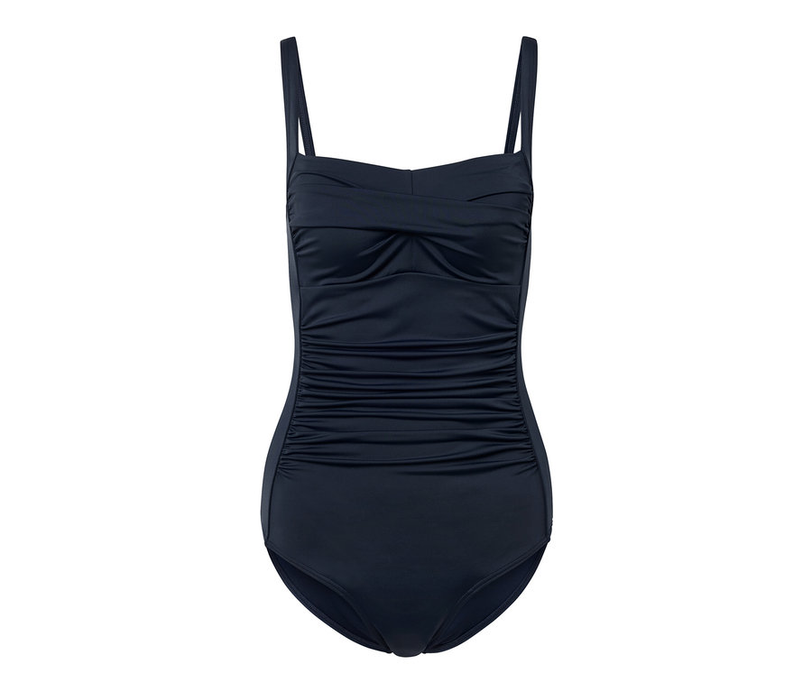 Modré tvarující plavky na bílém pozadí.