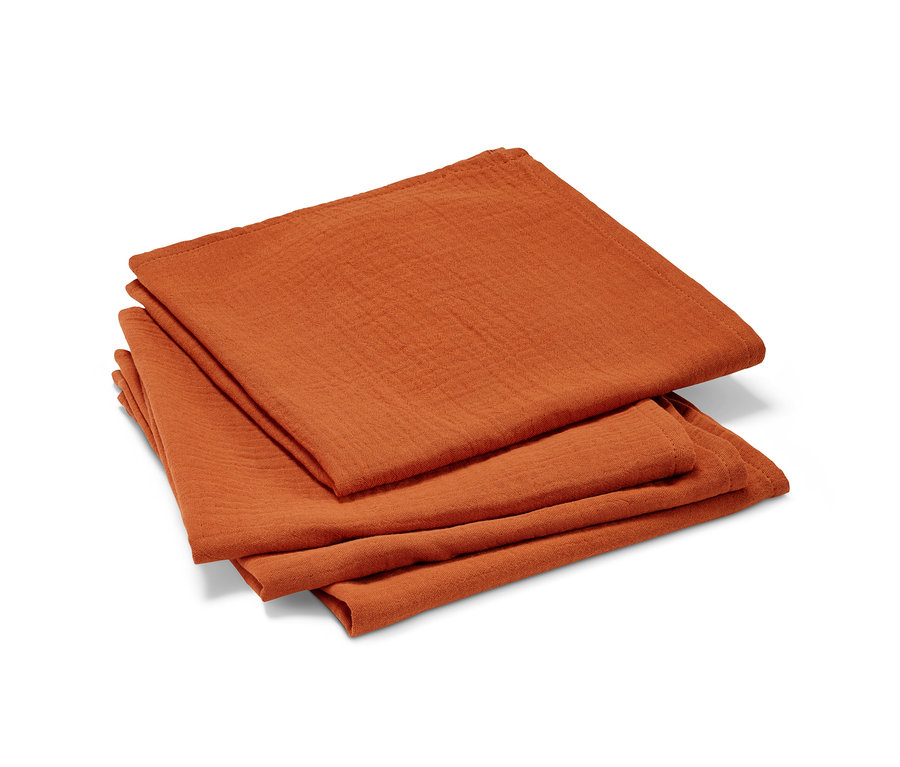 Hromada mušelínových ubrousků.