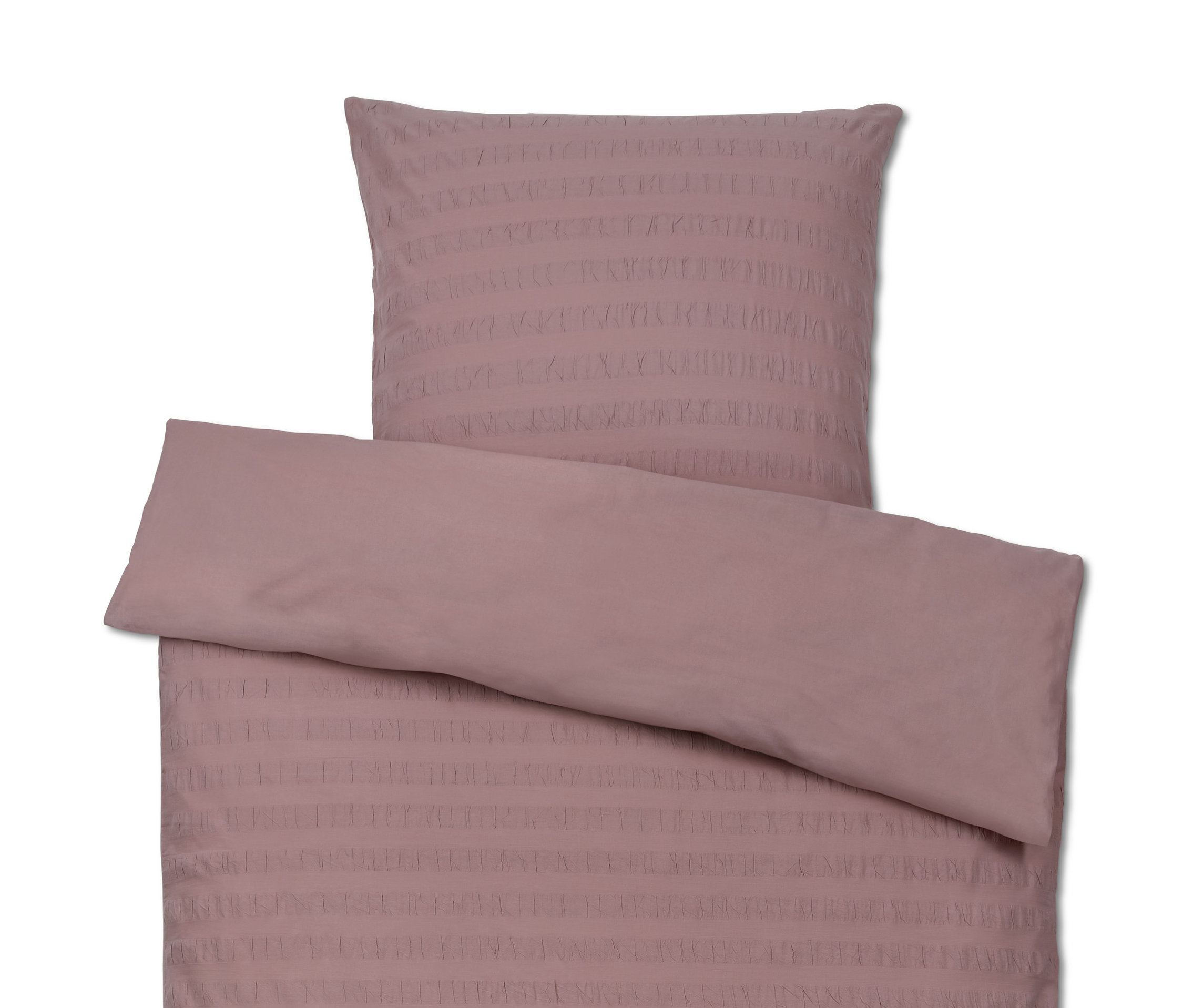 Růžové povlečení s polštářem.