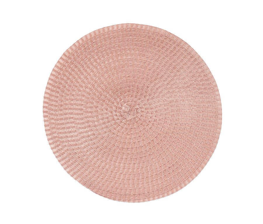 Detailní záběr na kulaté prostírání.