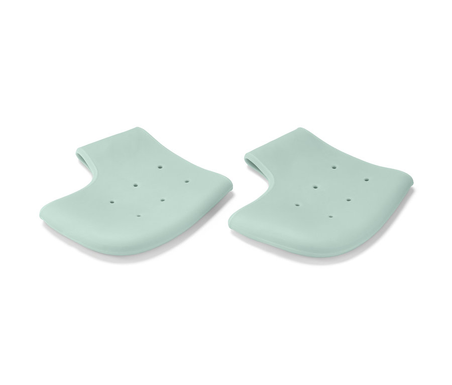 Dva světle zelené chrániče paty.