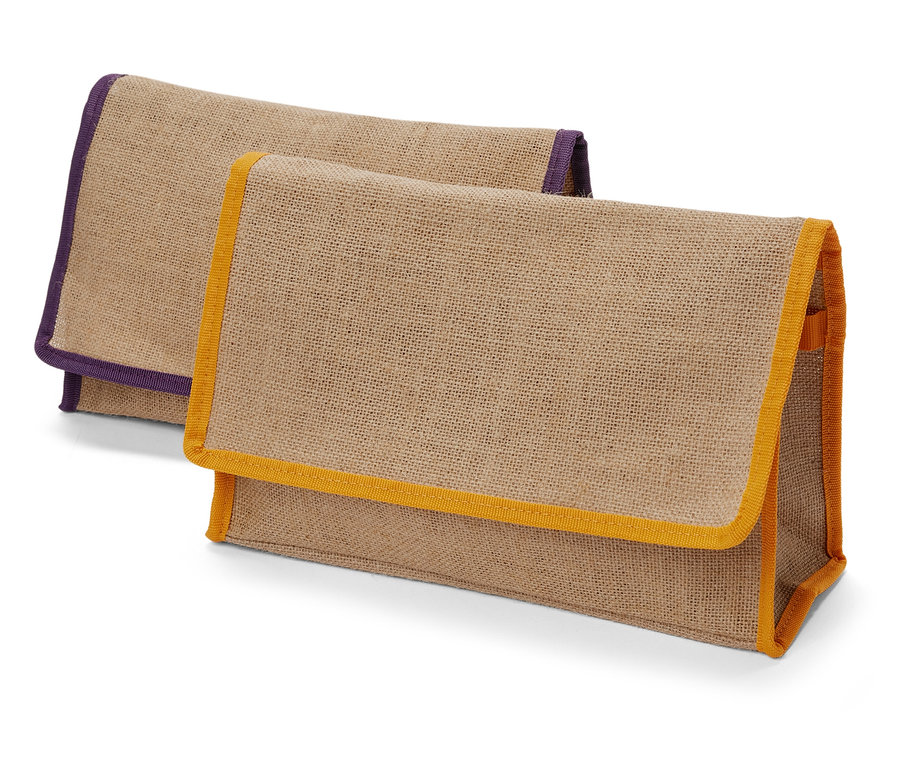 Dvě úložné tašky z hrubé tkaniny s barevným lemováním.