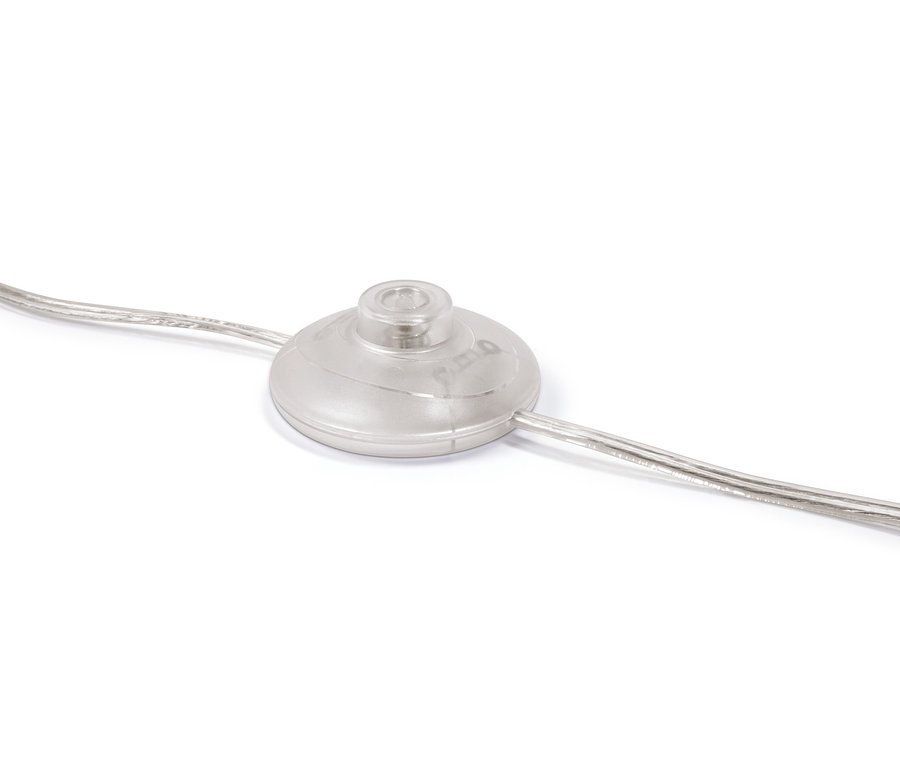 Detail nožního spínače stojací lampy Skleněná koule.