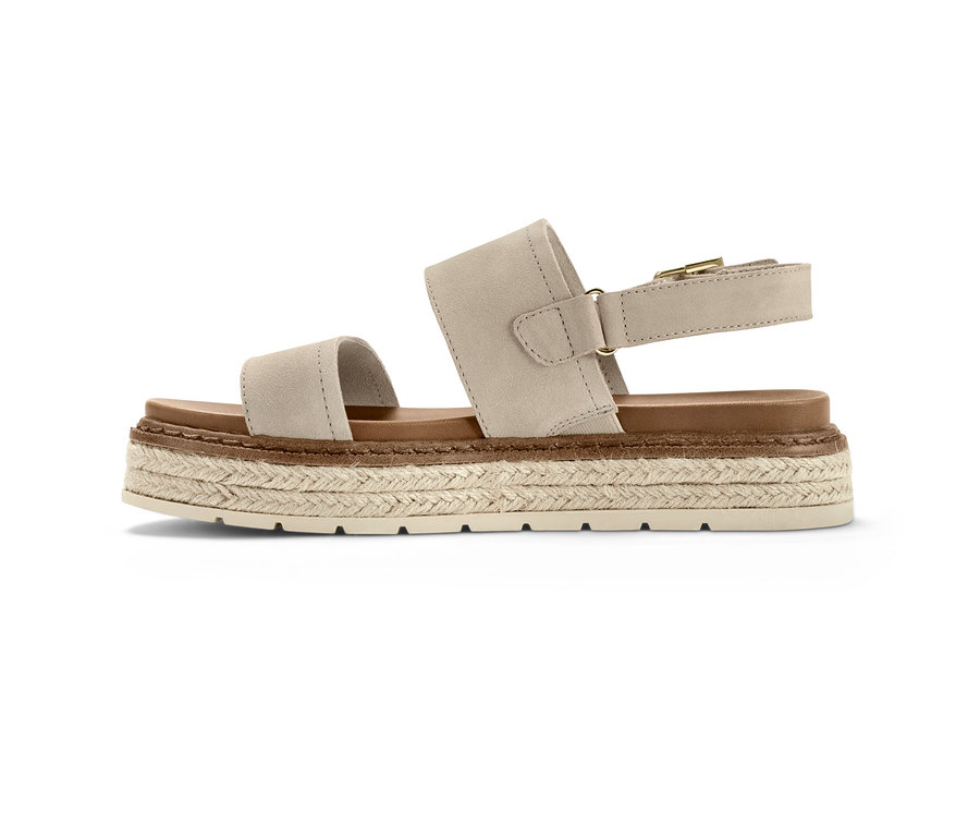 Béžové kožené sandály na platformě s hnědou podrážkou.