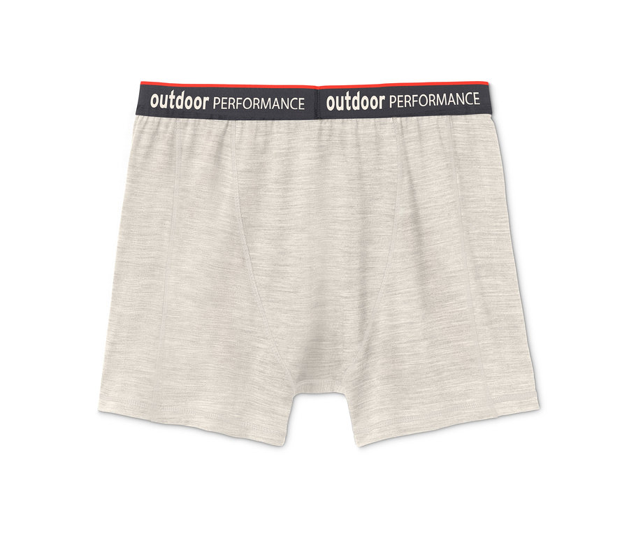 Béžové vlněné boxerky s černou gumou s nápisem outdoor performance.