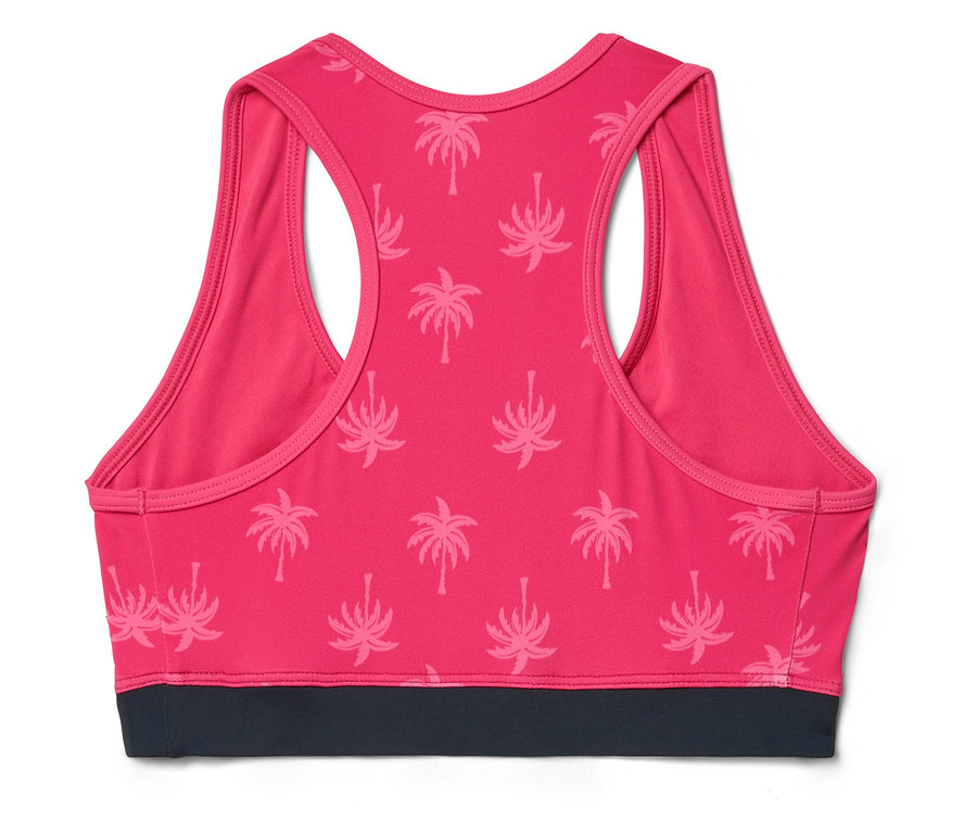 Pohled zezadu na růžovou sportovní podprsenku s palmovým vzorem a šedým pruhem.