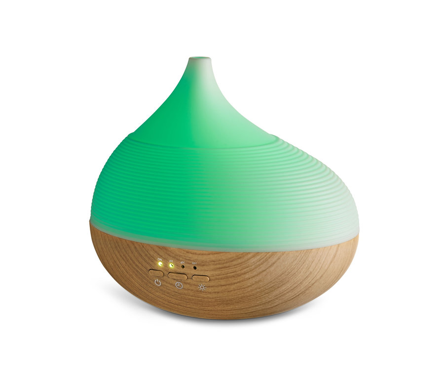 Zvlhčovač vzduchu Rozptylovač vonných esencí s wellness osvětlením se zeleným světlem.