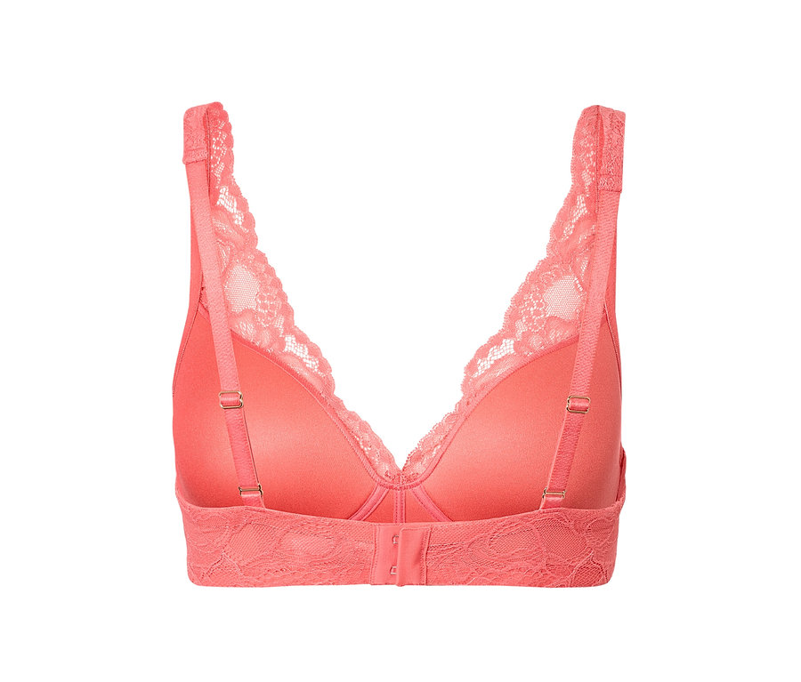 Detail zadní strany podprsenky s měkkými košíčky v papájové barvě s krajkovými detaily.