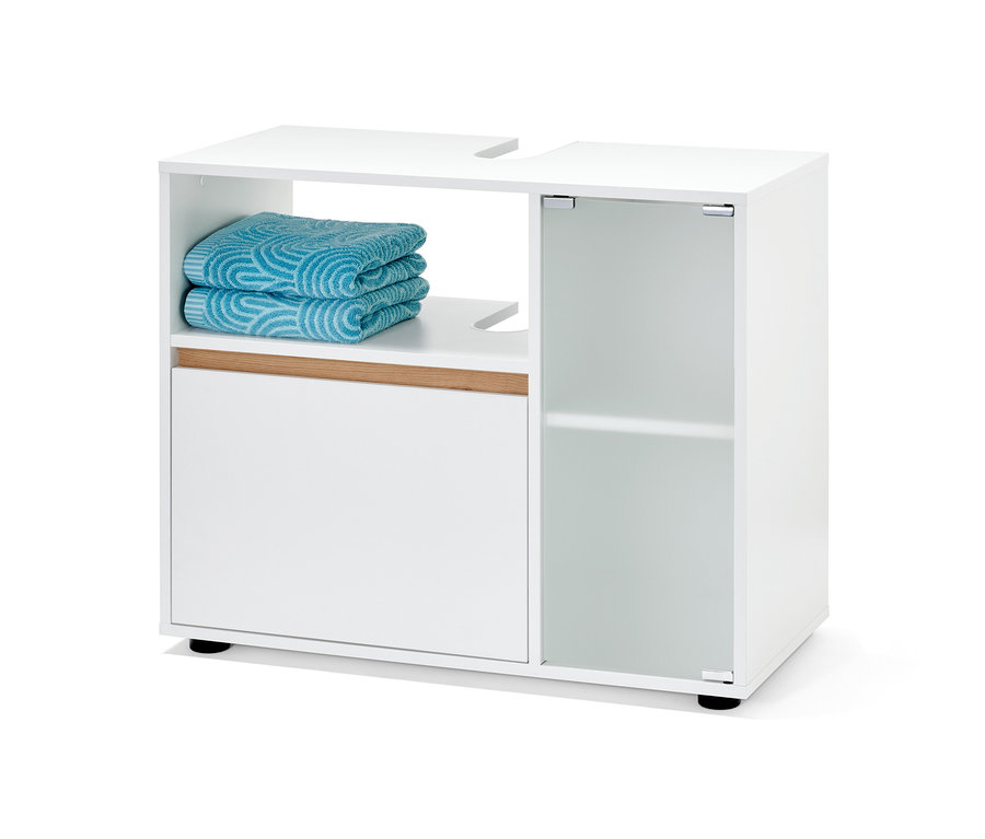 Koupelnová skříňka pod umyvadlo s ručníky.