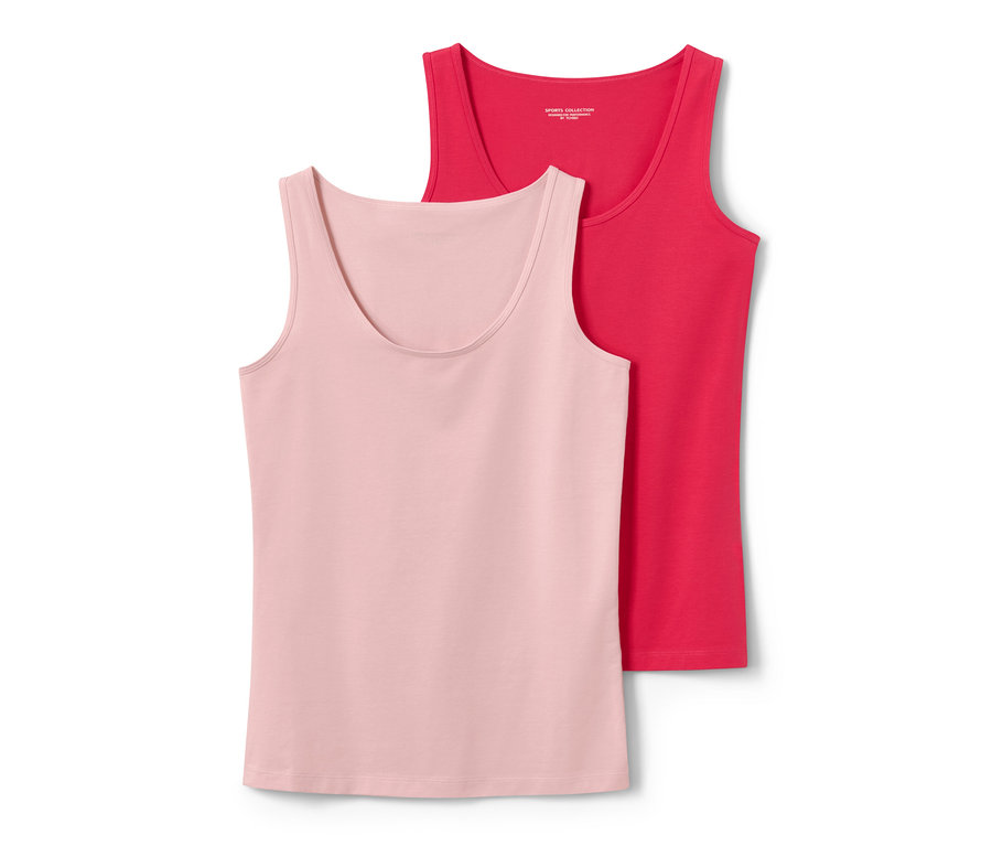 Dvě tílka světle růžové a růžové barvy leží na sobě.