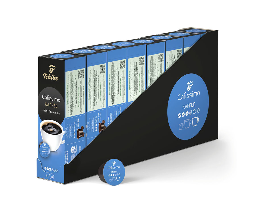 Řady balení Cafissimo Kaffee mild. Vpředu leží kapsle.