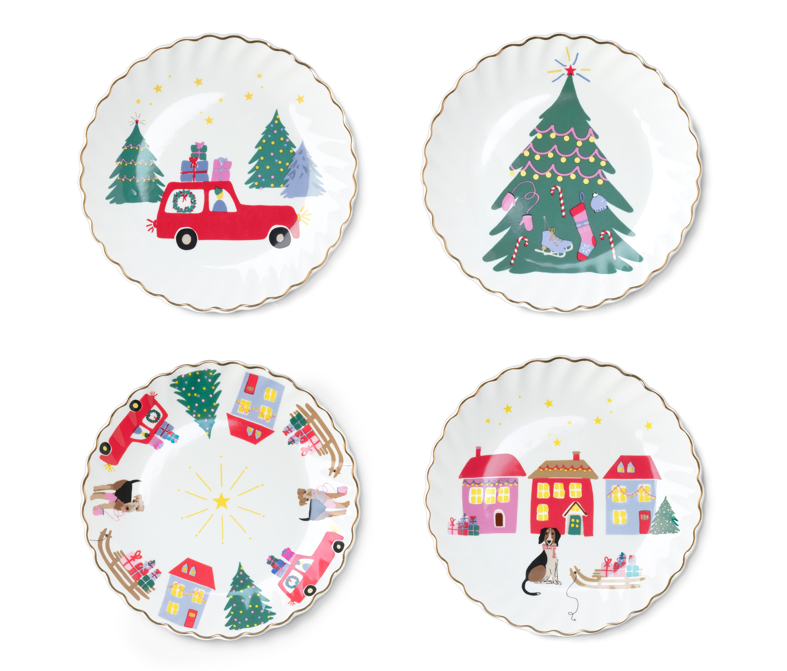 Čtyři dezertní talíře se zlatým dekorem, každý s jiným vánočním motivem.