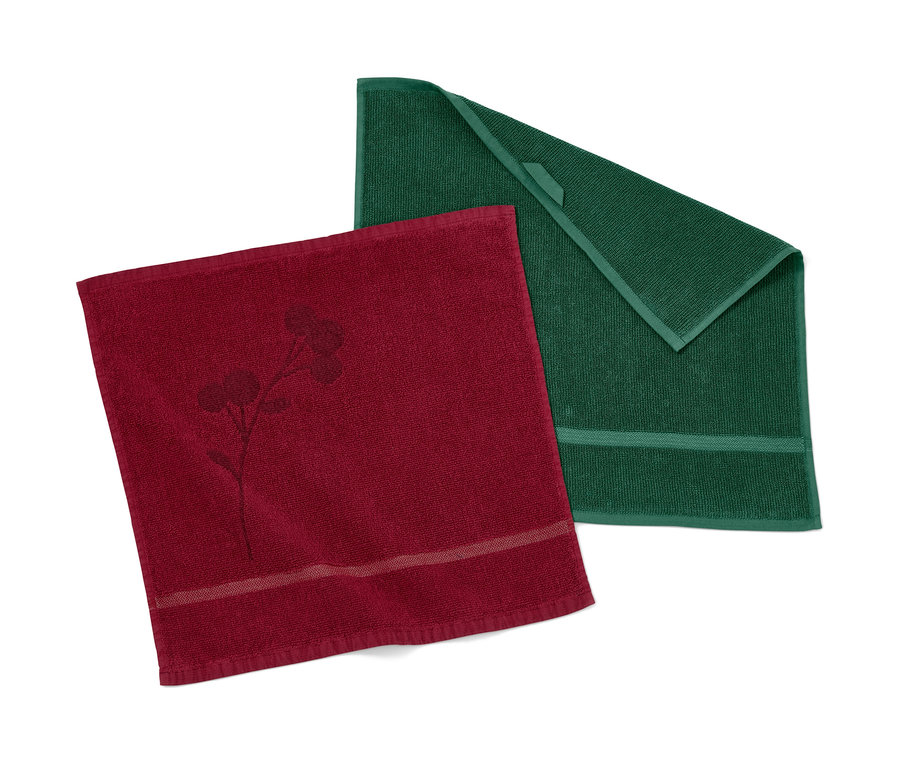 Dva froté kuchyňské ručníky, jeden bordó s potiskem květiny a jeden zelený.