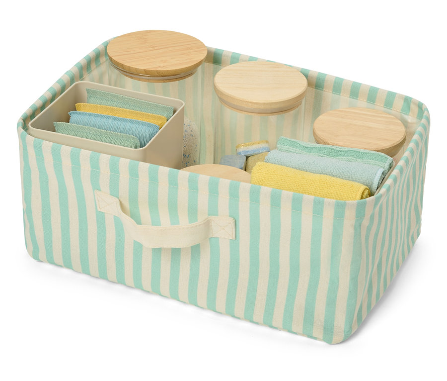 Plochý skládací úložný box s modro-bílými pruhy, naplněný sklenicemi, žínkami a organizérem.